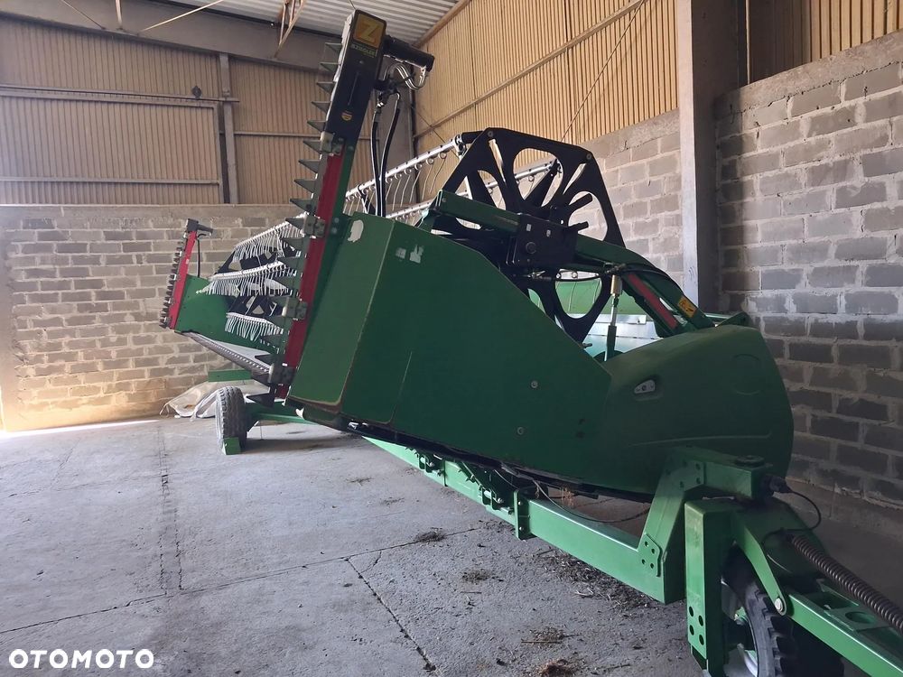 John Deere T670 - 9
