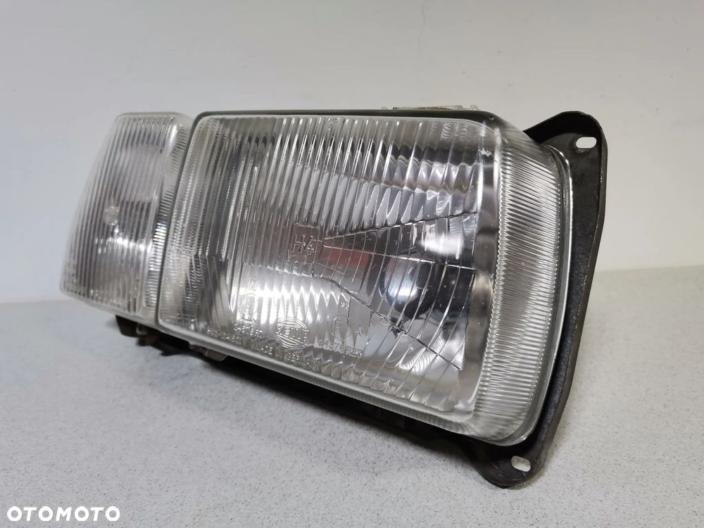 Lampa Reflektor LEWY VOLKSWAGEN PASSAT B2 80-88 HELLA Oryginał - 4