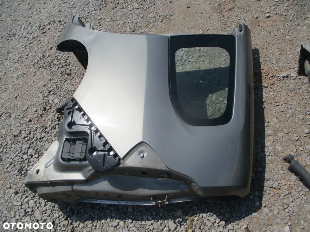 DACIA LODGY BŁOTNIK TYLNY LEWY TYŁ