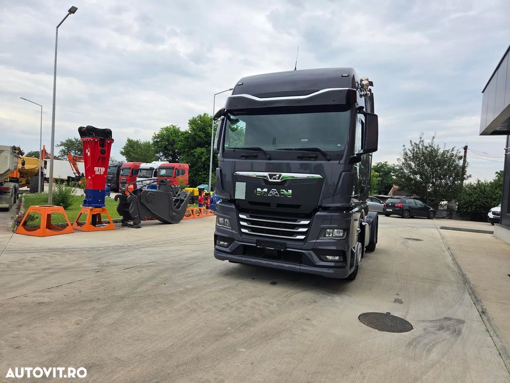 MAN TGX 18.510, 2023,126.353, AUTOMATA+RETARDER, 2 paturi, Cab inalta si lata cu SPOILERE, KIT BASCULARE, FRIGIDER, rulata in GERMANIA, Carte Identitate RAR, rezervor 600l aluminiu, volan piele, CA NOU, posibilitate leasing 4 ani-PROMOTIE 66.900 EUR+Tva - 33