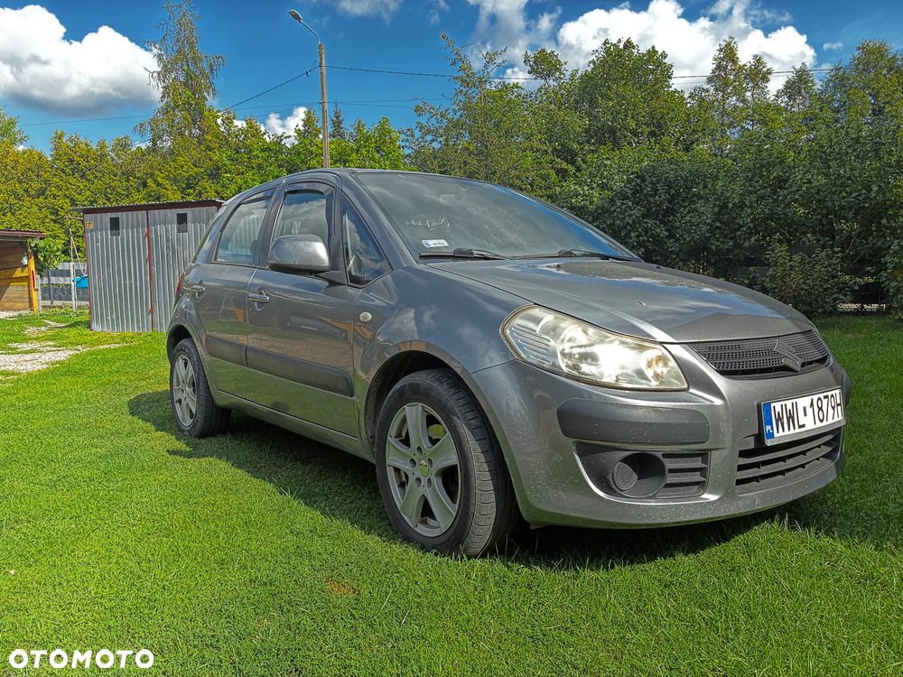 Suzuki SX4 1.6 GLX / Comfort - 1