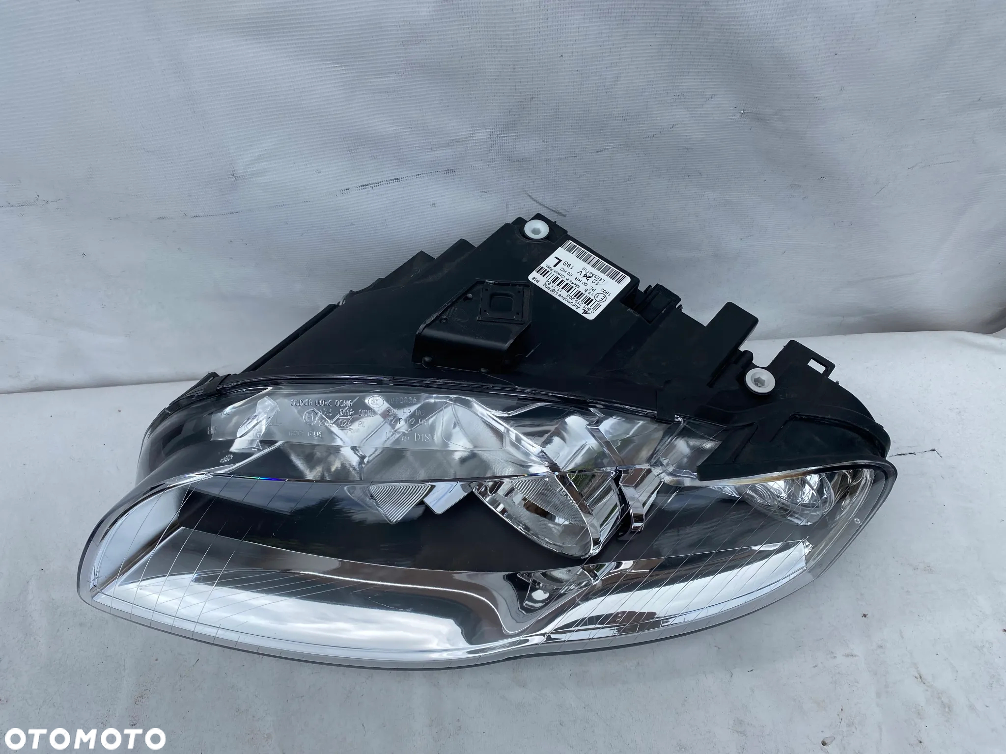 lampa audi a4 b7 lewa eu cała - 2
