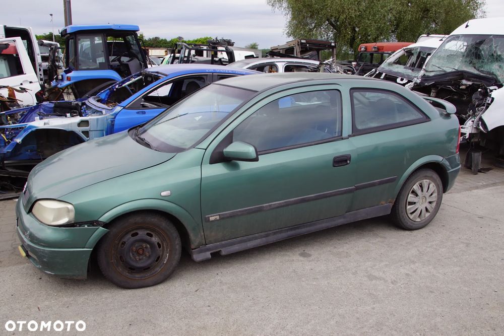 Auto na części - Opel Astra II G 1.6 16V 100 KM X16XEL F17 Z374 1998R Silnik Skrzynia Drzwi Maska Błotnik Zderzak Lampa Lusterko Klamka Szyba Deska Kokpit Sterownik Moduł Czujnik Licznik Panel Kierownica - 2