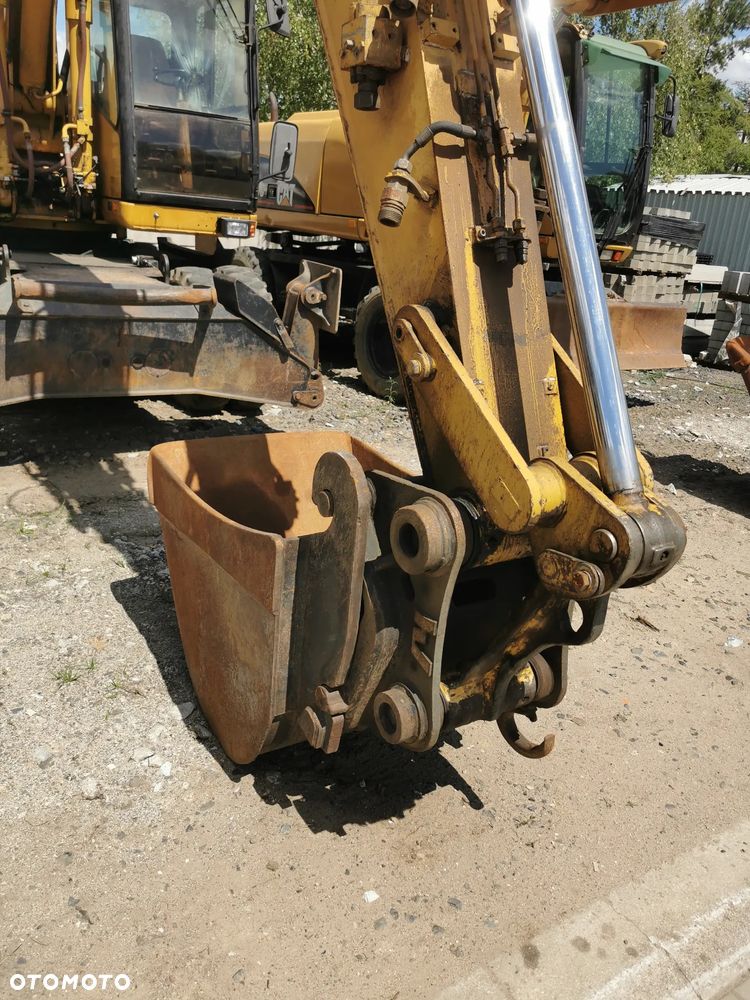 Caterpillar 315 - 12
