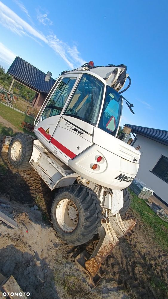 Mecalac 714 - 4