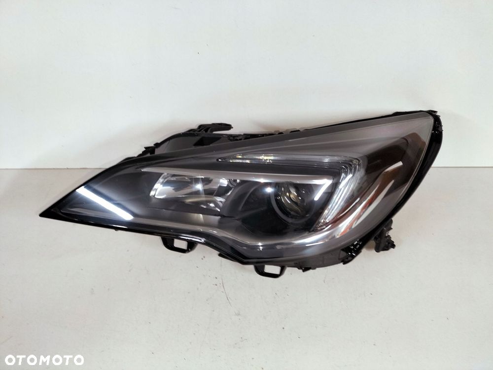 lampa przednia reflektor lewa opel astra v k 15- - 1