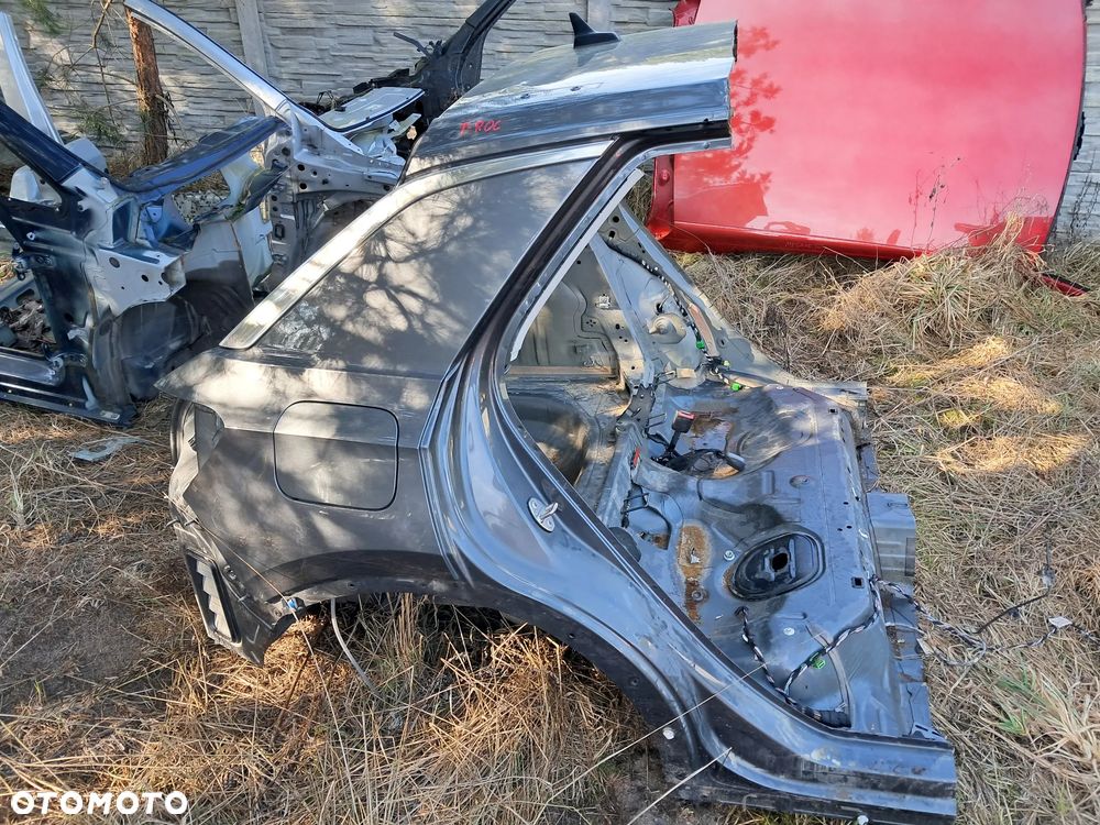 BŁOTNIK PRAWY ĆWIARTKA TYŁ VOLKSWAGEN TROC - 1