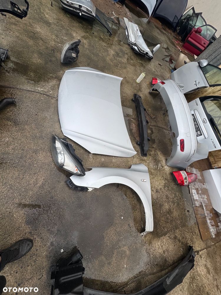Hyundai i30 srebrny szary kolor 2R XP zderzak przód przedni pas przedni z chłodnicami lampy lampa soczewki soczewka soczewkowe maska srebrna błotnik prawy lewy przedni zbiornik zbiorniczek spryskiwaczy płynu podszybie drzwi szybka prawa lewa przednia tylnia drzwi przednie tylne prawy przód prawy tył przód lewy tył lewy klapa bagażnika bagażnik zderzak tylni tył kombi lampy tył tylnie prawa lewa belka przód przednia belka tylnia tył obudowa filtra powietrza lusterko prawe lewe - 14