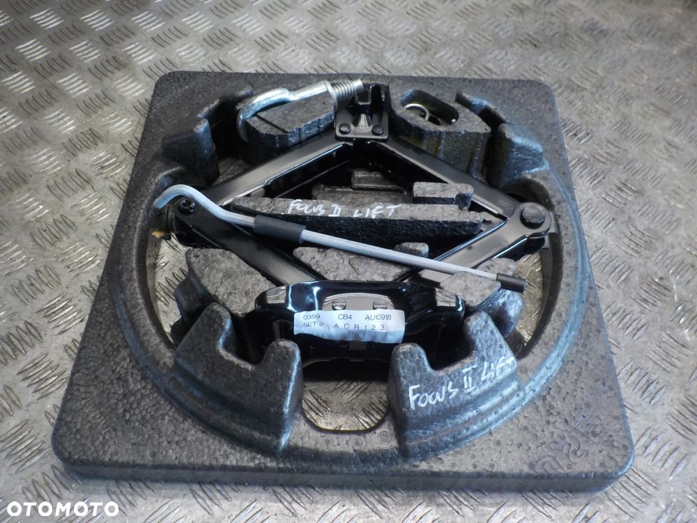 FORD FOCUS MK2 PODNOŚNIK LEWAREK UCHO HOLOWNICZE WKŁAD KOŁA - 1