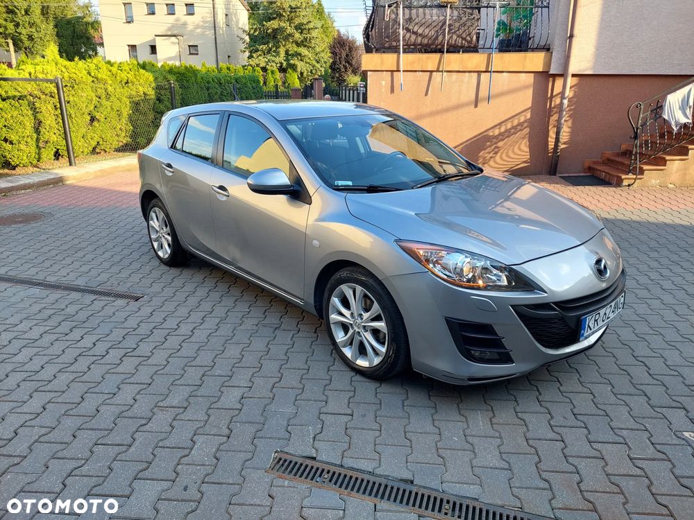 Mazda 3 1.6 Exclusive + - 3