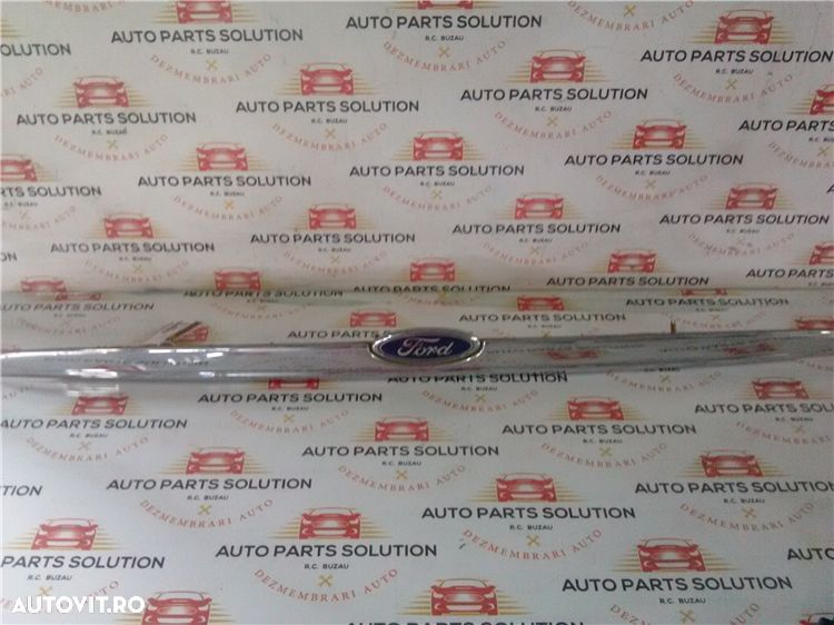 grila capota spate cu emblema ford focus 1 sedan an fabr.2004 - 1