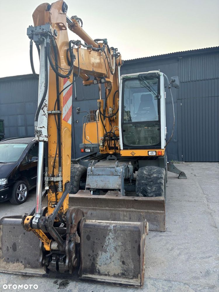 Liebherr A312 Litronic - 2