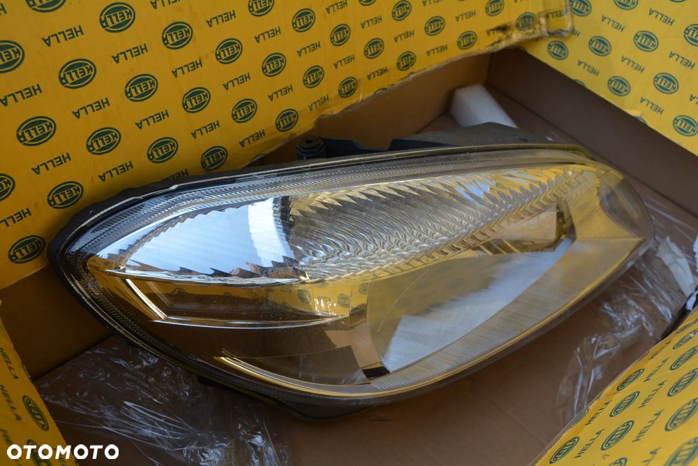 Skoda Fabia / Roomster Reflektor HELLA 1EL 010 417-371 (Z lewej) - 2