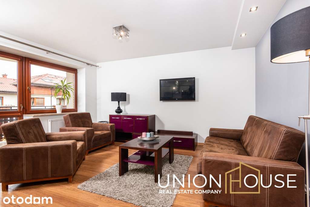 Zadbany apartament z dużym balkonem i garażem