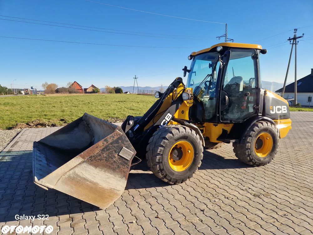 JCB 406 - 9