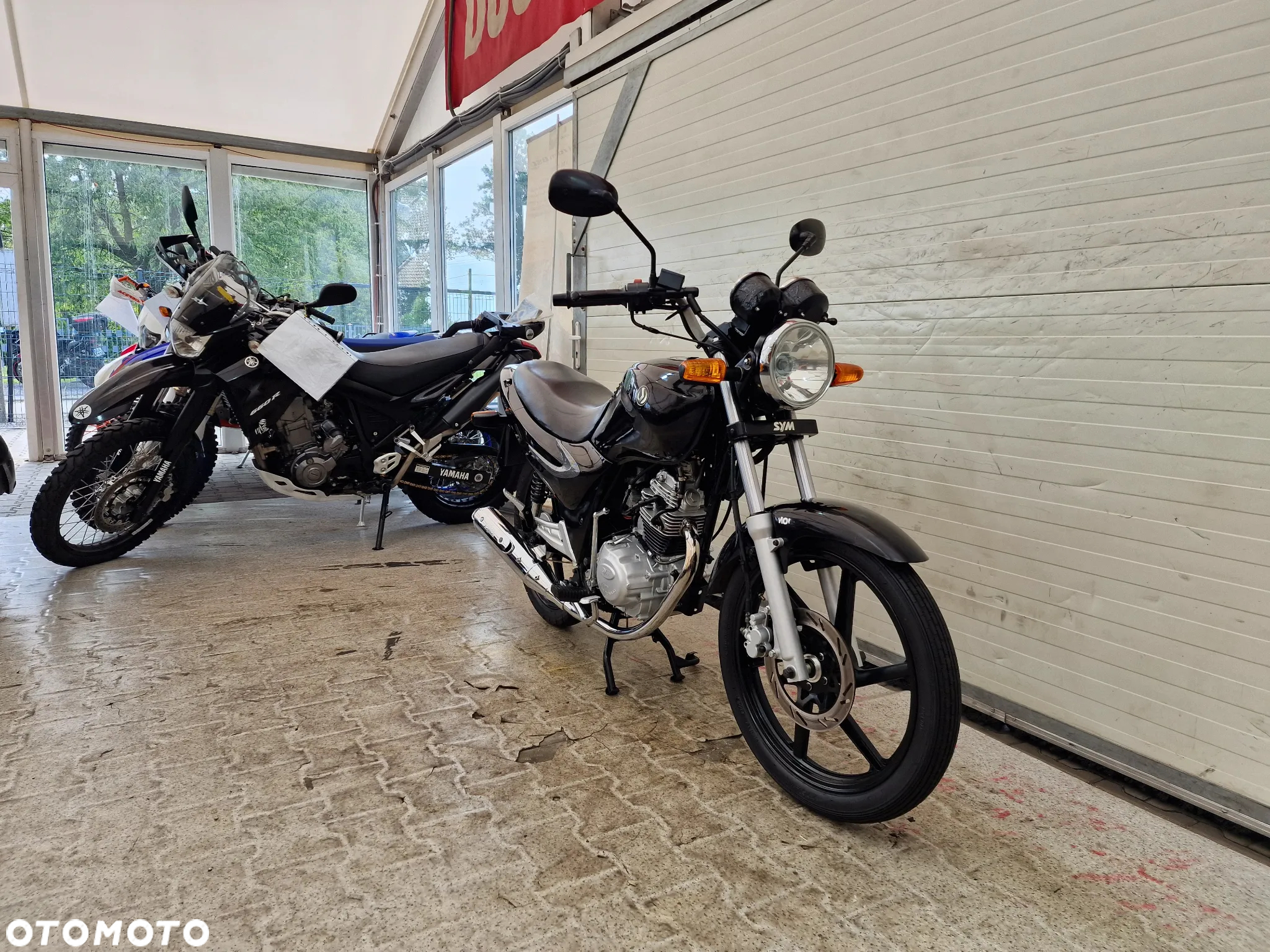 SYM XS - 4
