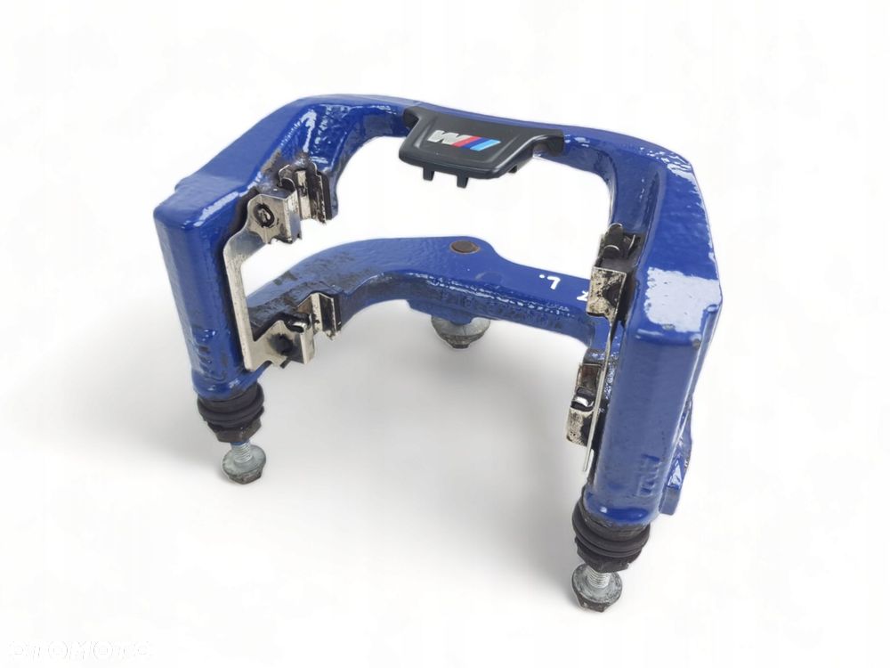 Jarzmo Mocowanie Zacisku Lewy Tył BMW M5 G30 F90 4.4 V8 - 4