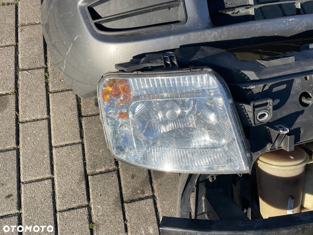 FIAT PANDA II LIFT BŁOTNIK LEWY PRAWY MASKA lampa zderzak lewa lewy przód pas przedni 695 - 9