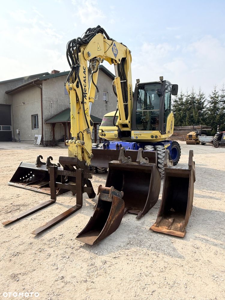 Mecalac Koparka 14 ton MECALAC 15 MWR koparko-ładowarka 3 łyżki widły 1 wł Centr.smarowanie Opony na BLIŹNIAKU 80%Camso ładowarka 714 12MTX 4x4 skrętne KLIMA kabina Premium silnik 146KM volvo EW140B DEUTZ szybka 35km/h - 7