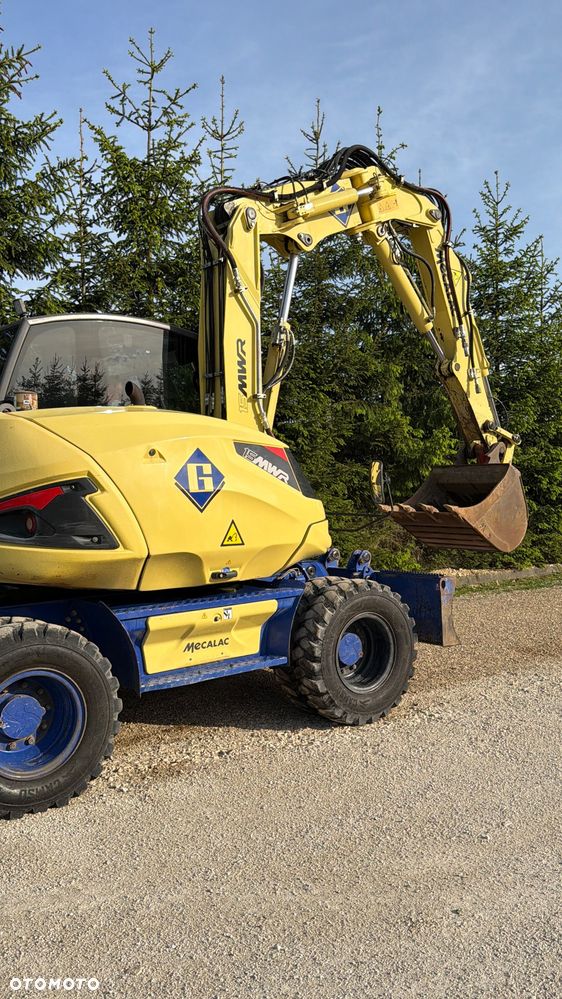 Mecalac Koparka 14 ton MECALAC 15 MWR koparko-ładowarka 3 łyżki widły 1 wł Centr.smarowanie Opony na BLIŹNIAKU 80%Camso ładowarka 714 12MTX 4x4 skrętne KLIMA kabina Premium silnik 146KM volvo EW140B DEUTZ szybka 35km/h - 40