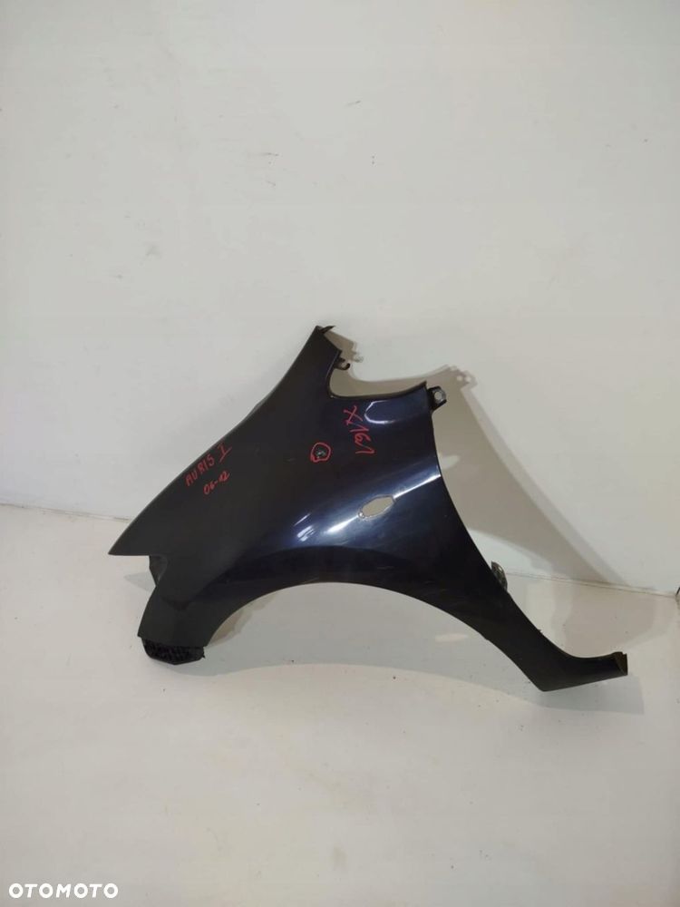 BŁOTNIK LEWY PRZEDNI TOYOTA AURIS 06-10 - 1