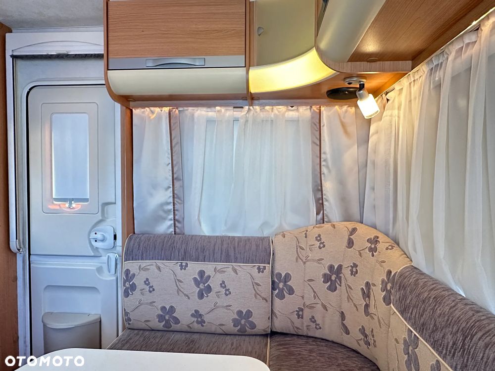 Adria ADORA 472 LU z napędem i markizą ze ścianami.  DMC 1300 - 14