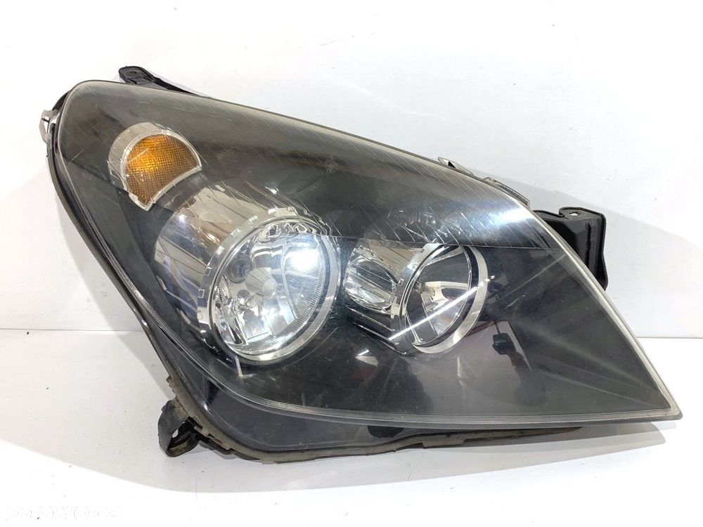 REFLEKTOR PRAWY PRZÓD  OPEL ASTRA H Kombi (A04) 2004 - 2014 1.9 CDTI (L35) 74 kW [100 KM] olej - 1