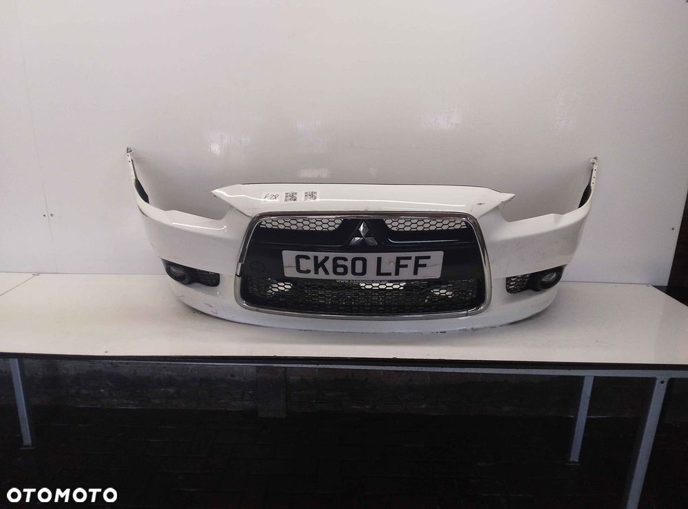} ZDERZAK PRZÓD PRZEDNI MITSUBISHI LANCER X 8 VIII BIAŁY HALOGENY - 1