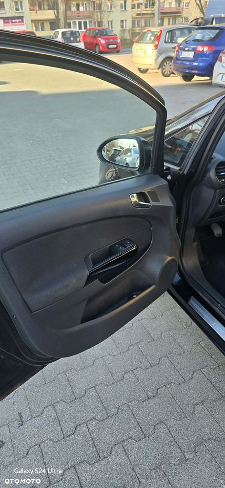 Opel Corsa 1.4 16V Cosmo - 7