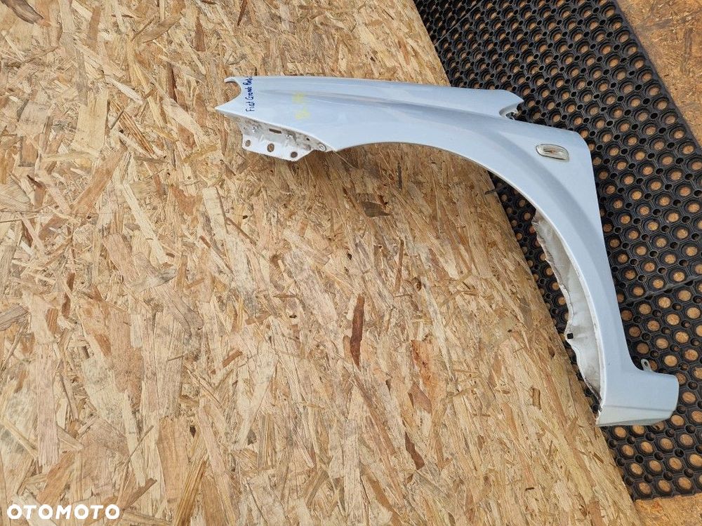 FIAT PUNTO EVO kod lak.760 a BŁOTNIK PRZÓD PRZEDNI LEWY - 6