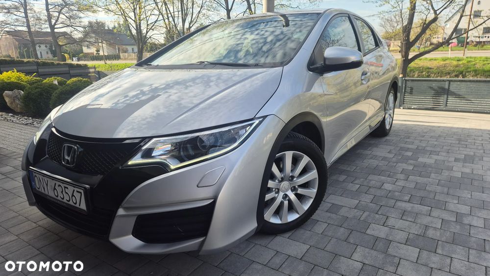 Honda Civic 1.4 i-VTEC Elegance - 1