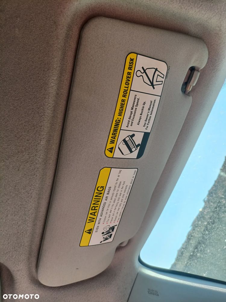 MITSUBISHI OUTLANDER II 06-10 2007 r. daszek lewy osłona przeciwsłoneczna lewa  * - 2