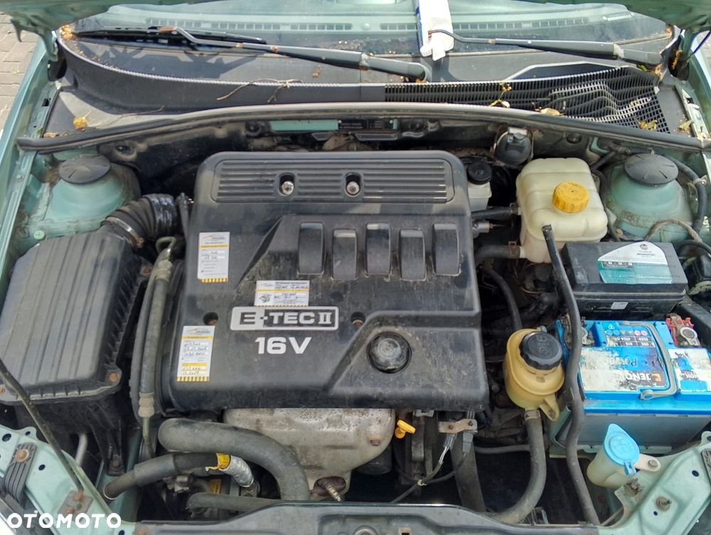Chevrolet Lacetti I (03-09r.) 1.6 B 108KM. Silnik F16D3 Skrzynia EMG.Cały na części.GWARANCJA !!! Przód Tył Zestaw Komplet Drzwi Klapa Zderzak Błotnik Maska Grill Atrapa Szyba Pas Lampa Lusterko Boczki Fotel Kanapa Kokpit Deska Rozdzielcza Przełącznik Włącznik Sterownik Przewody Wiązka Instalacja Moduł Komputer Czujnik Listwa Pompa Alternator Wtryski Głowica Rozrusznik Kompresor Sprzęgło Dwumas Silnik Skrzynia ABS Klimatyzacji Paliwa Wspomagania Kolektor Turbina Przepustnica Zawór Chłodnica Koło Hak Belka Sanki Zawieszenie Mcpherson Półoś Amortyzator Wydech Tłumik Zacisk Most - 7