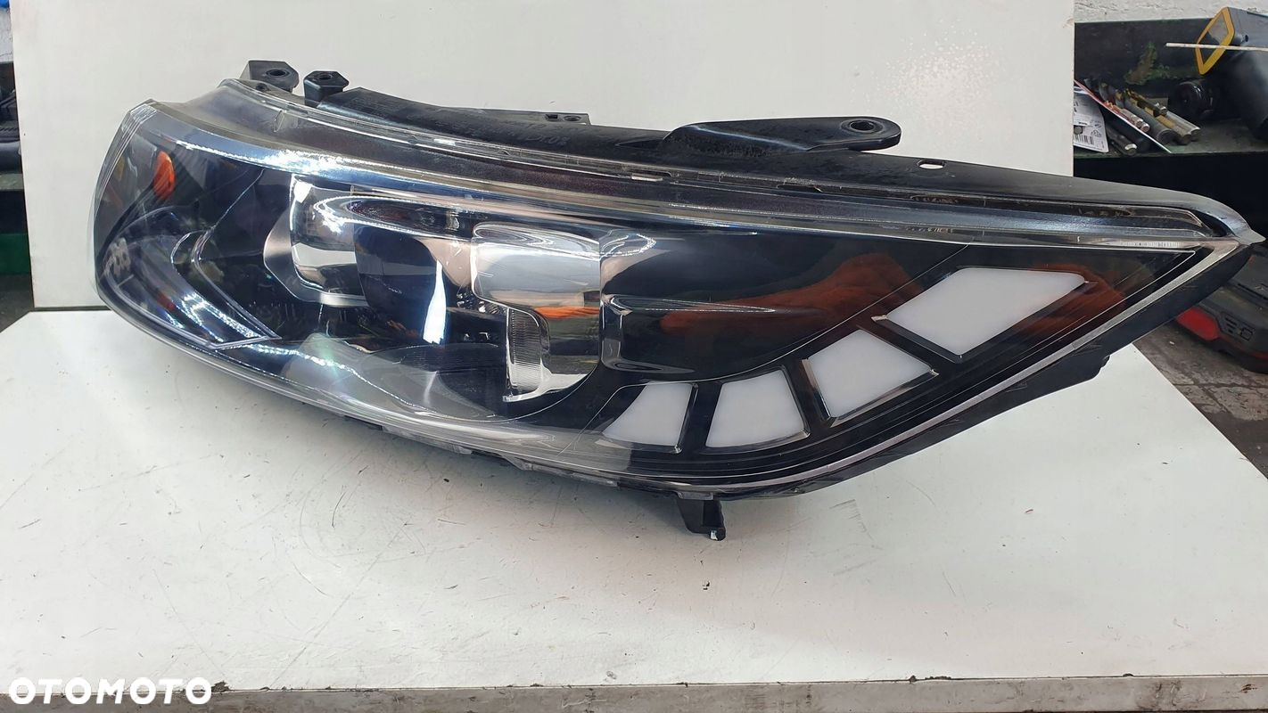 KIA Optima 3 III 10- lewa lampa przednia przód reflektor € - 4