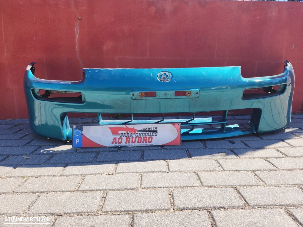 Parachoque mazda 323 - 1