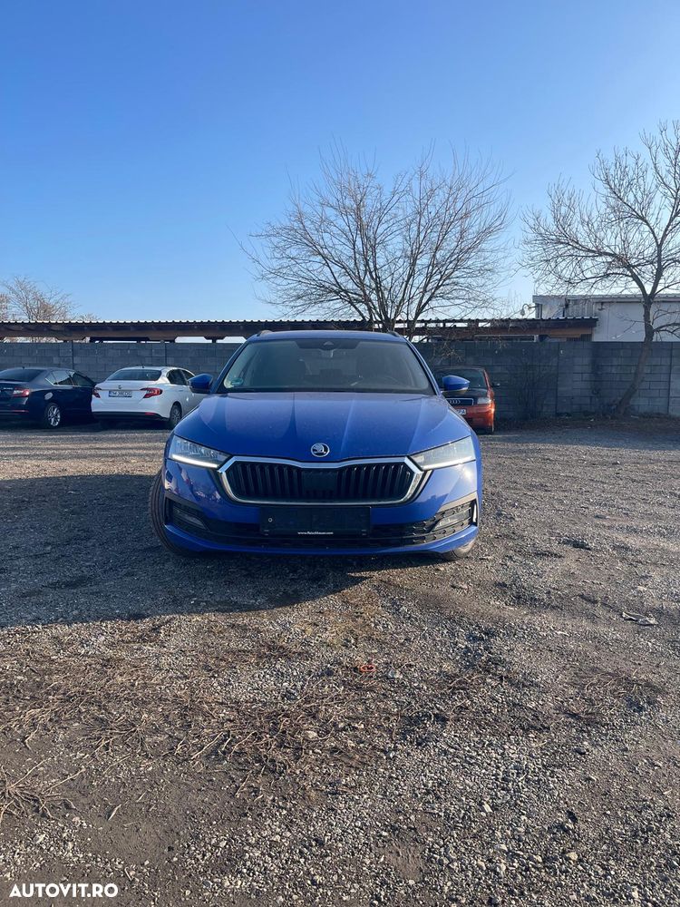 Skoda Octavia Combi 2.0 TDI DSG Exclusive - 1