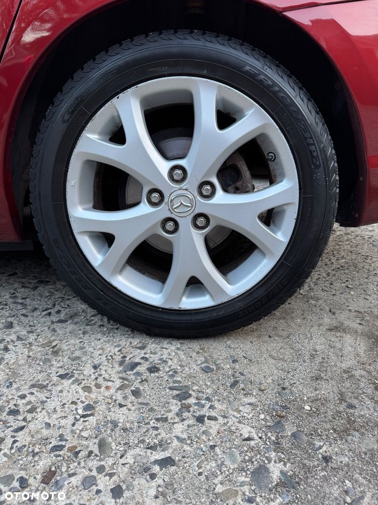 Mazda 3 2.0 Exclusive + - 16