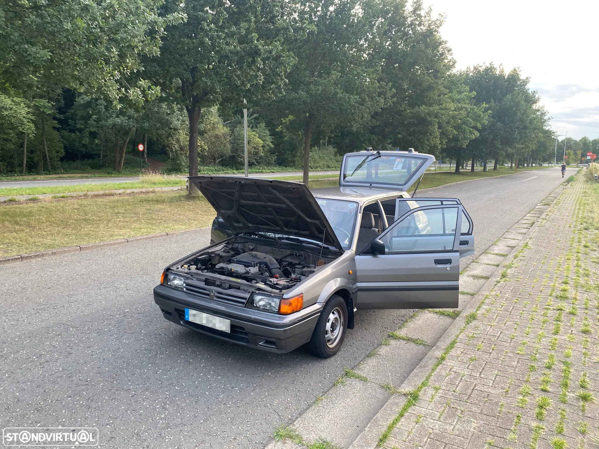 Nissan Sunny Hatchback 1.4 SLX - 7