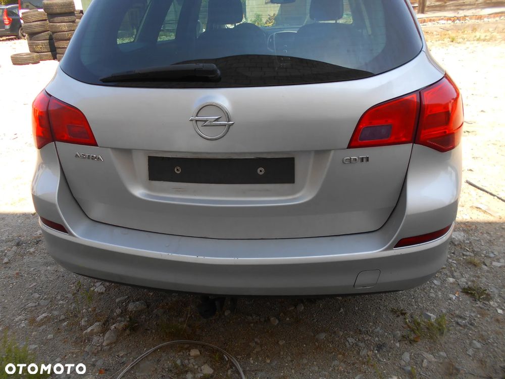 OPEL ASTRA J SPORT TOURER KOMBI KOD LAKIERU Z176 92KW-125KM  SILNIK SKRZYNIA BIEGOW MANUALNA 6 BIEGOWA MASKA LAMPA LUSTERKO PAS PRZEDNI BLOTNIK ZAWIESZENIE  ZDERZAK PRZOD SPRYSK SPRISKIWACZ LAMP SOCZEWKA CZESCI - 13