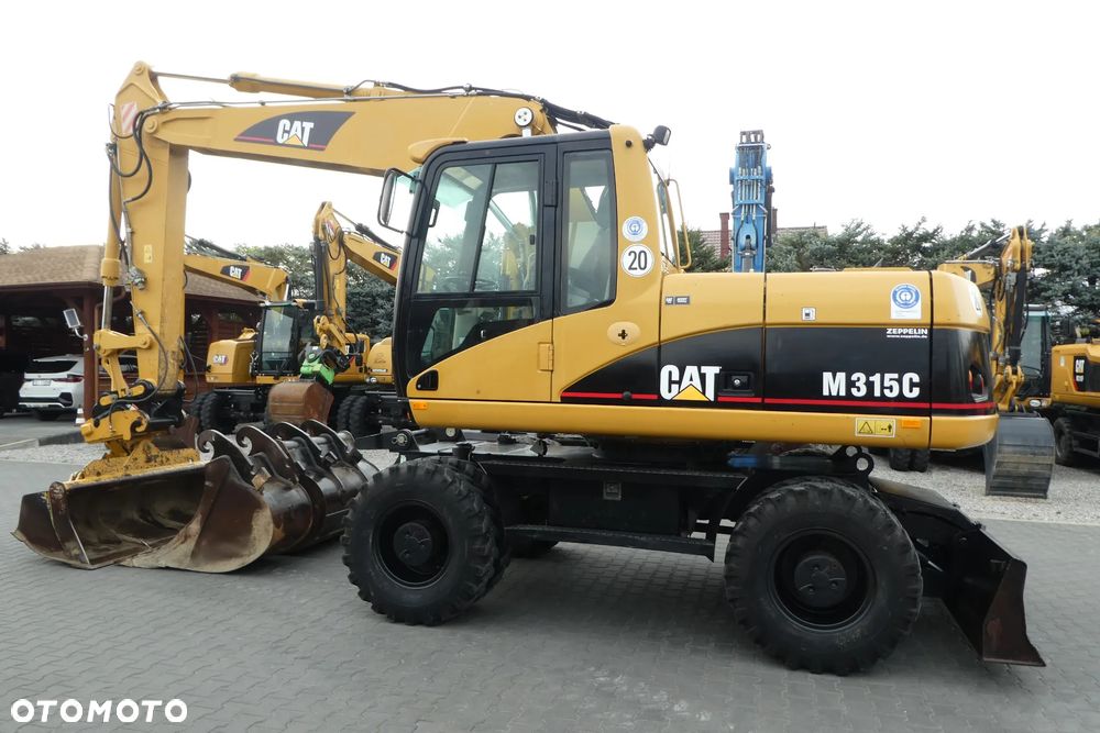 Caterpillar M315C Z NIEMIEC TRZY ŁYZKI