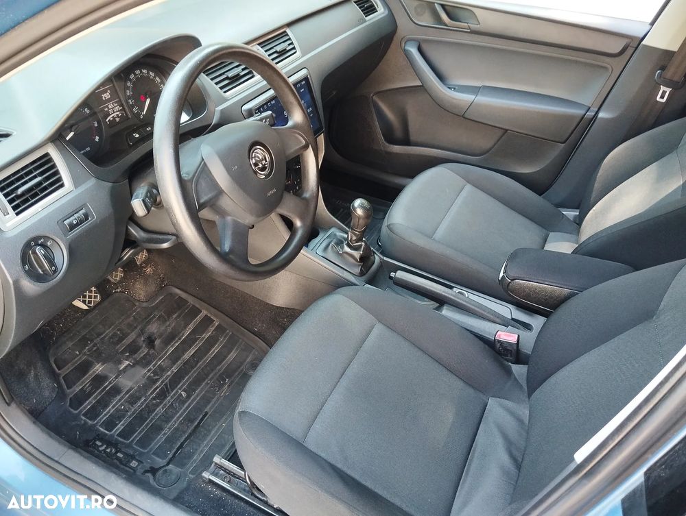 SKODA Rapid 2013 — imagine 9