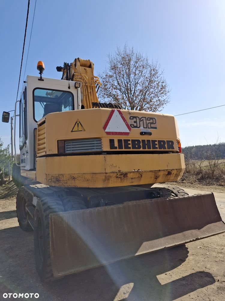 Liebherr A312 CAT JCB - 14
