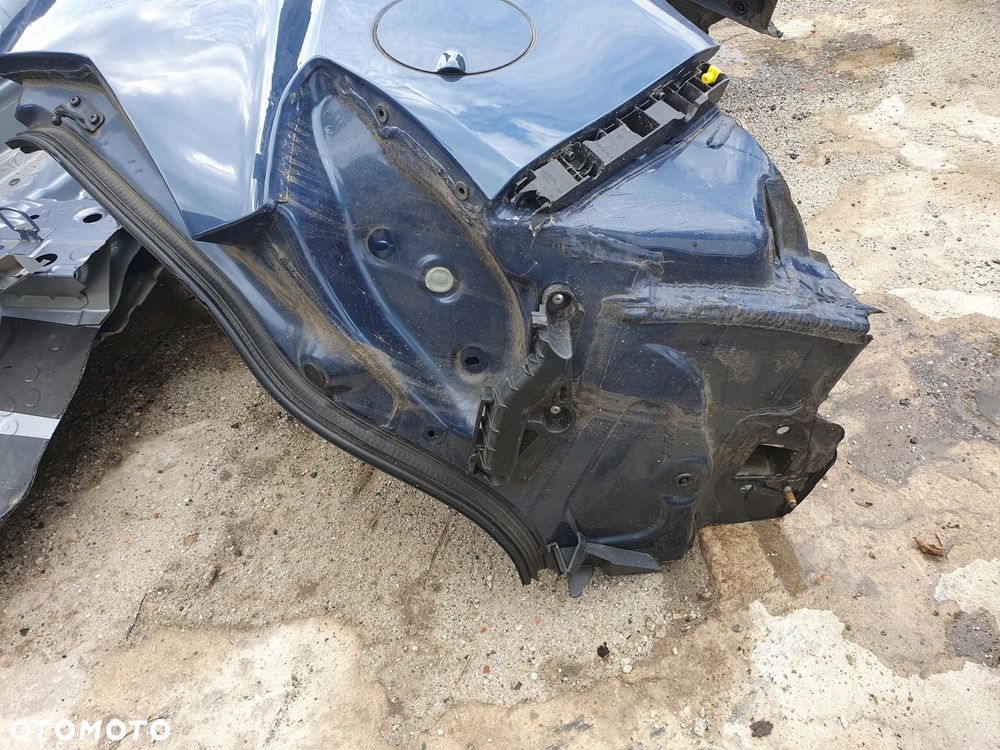błotnik prawy tył Opel Corsa E 5d - 2