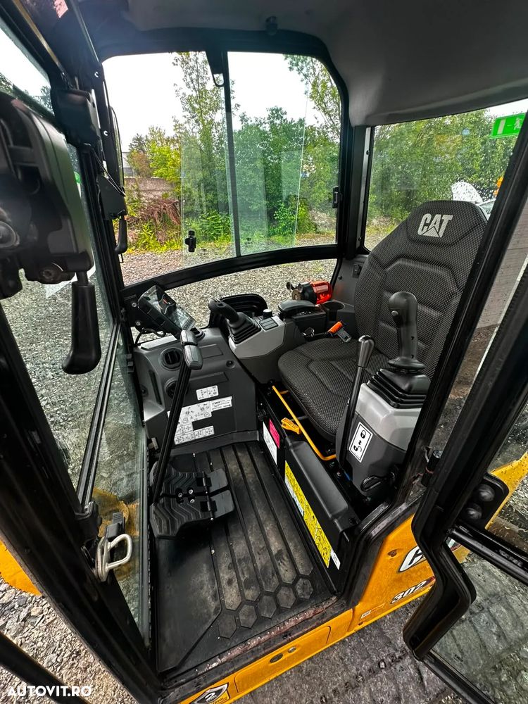 Caterpillar 302 - 9