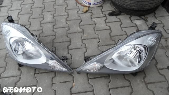 HONDA JAZZ 2010 REFLEKTOR LAMPA PRZÓD LEWA