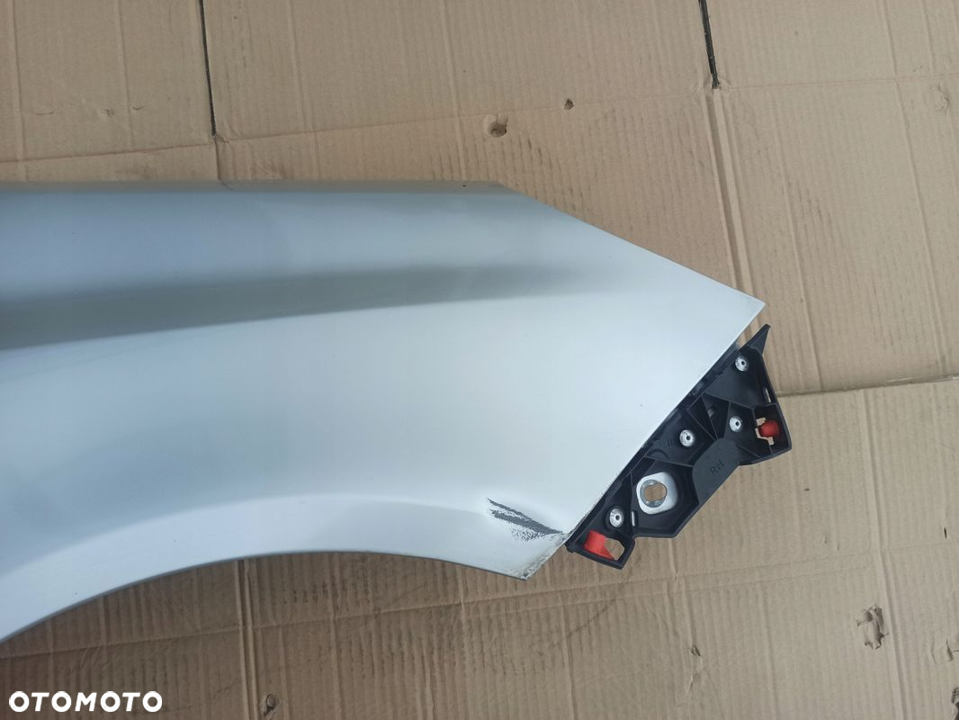 Błotnik prawy przód OPEL CORSA D Z157 06-11 - 7