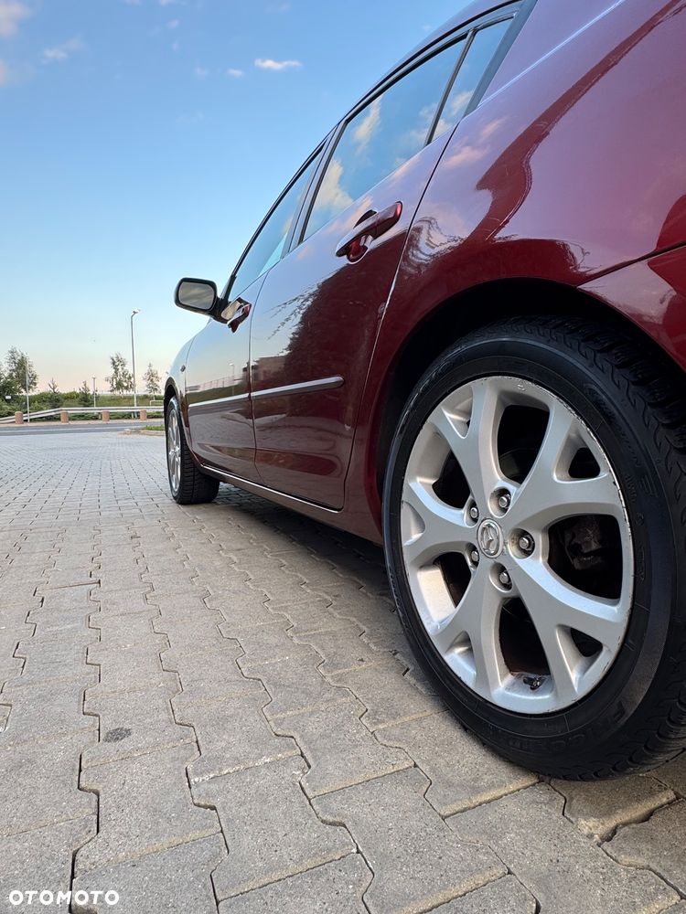 Mazda 3 2.0 Exclusive + - 12