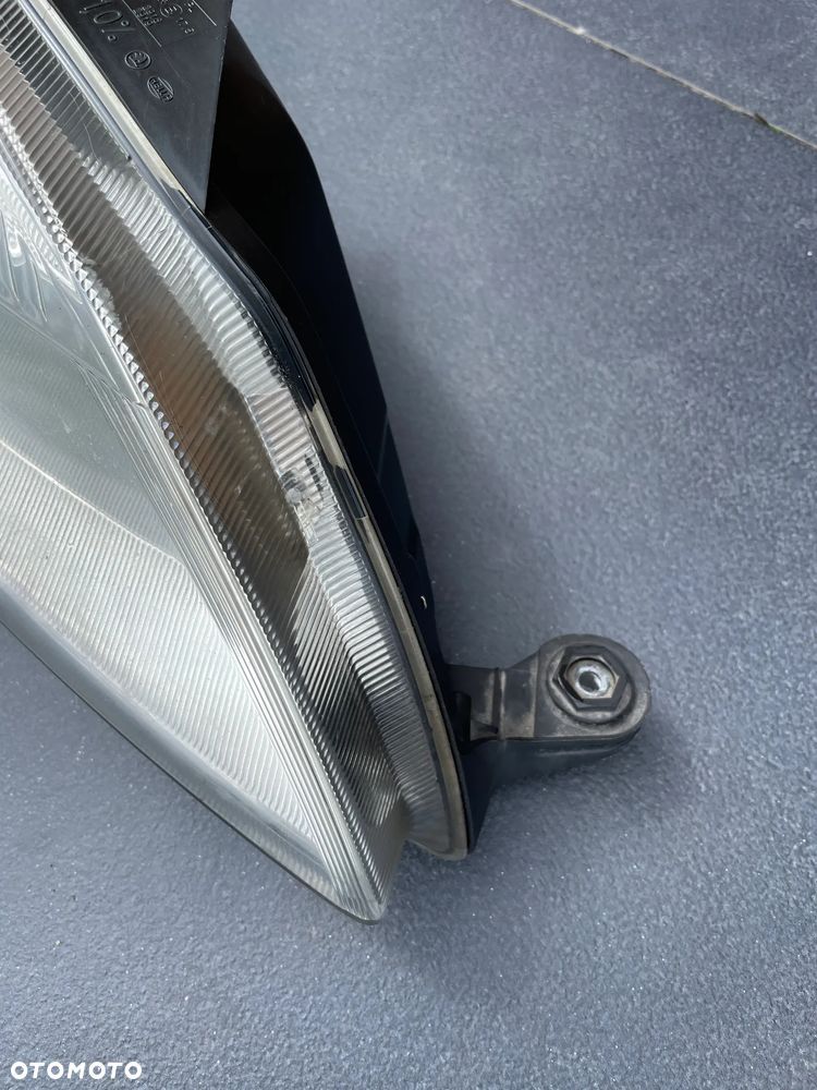 SKODA FABIA II reflektor lampa prawa prawy przód przednia LIFT 10- - 2
