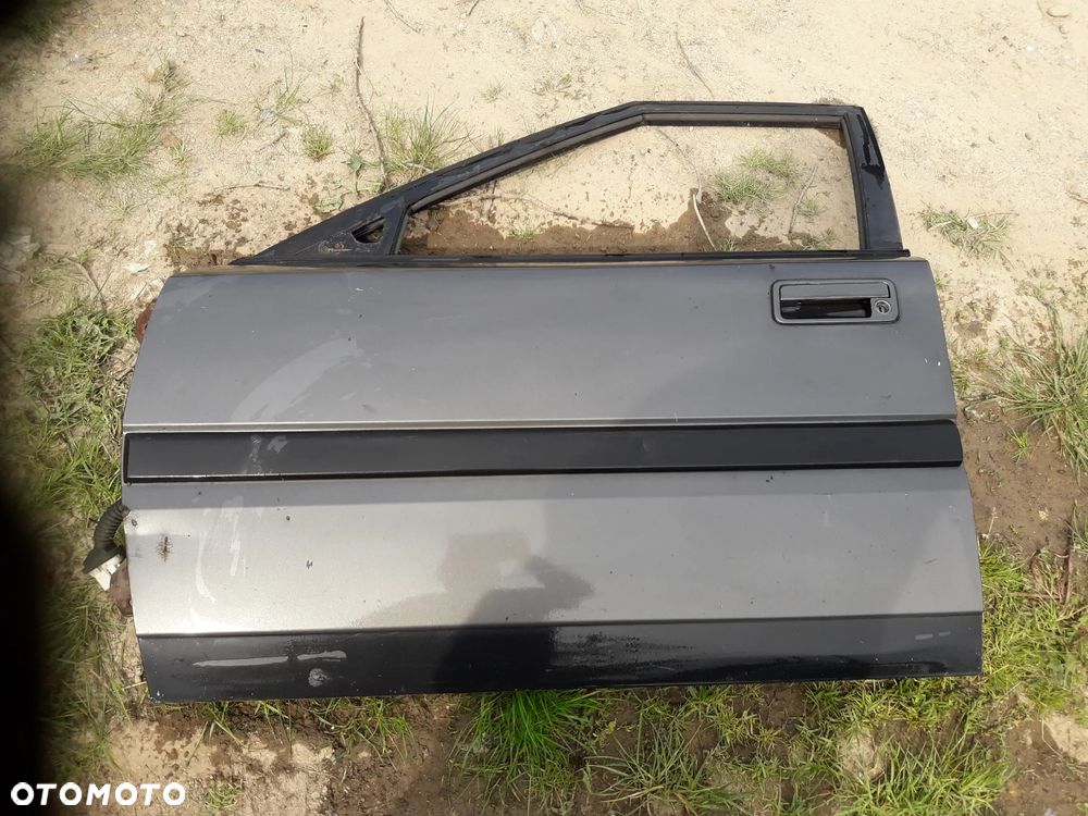 Mazda 323f bg 89-94  Drzwi przednie lewe szyba - 1