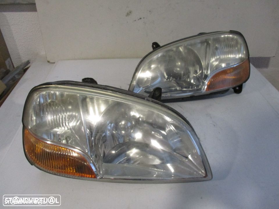 Farol Optica esquerdo / direito Suzuki Swift - 1